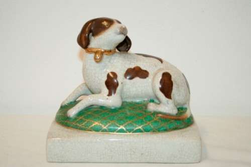 A wonderful vintage porcelain "laying dog" figurine by "Wong Lee" - original Chinese porcelain