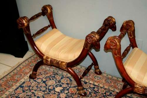 Two incredible rare vintage Empire parcel gilt curule chairs w/ ram's-head detailing - price/ chair