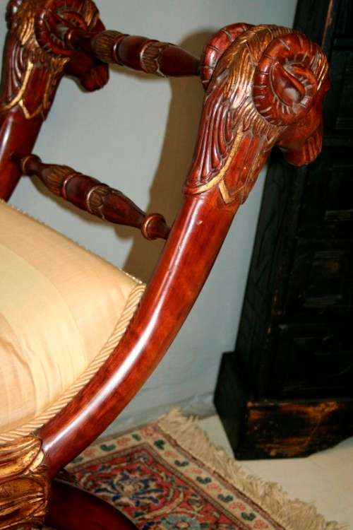 Two incredible rare vintage Empire parcel gilt curule chairs w/ ram's-head detailing - price/ chair