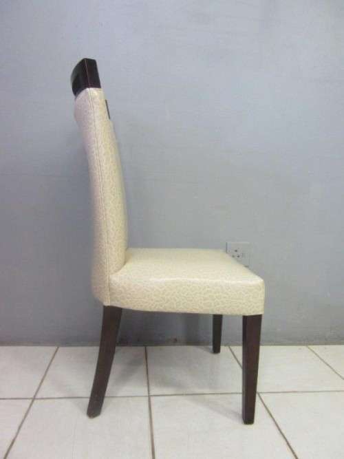 A stunning and extremely stylish high-back occasional chair in a superb patent-leather feel fabric
