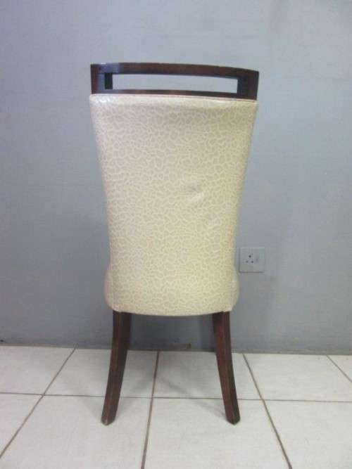 A stunning and extremely stylish high-back occasional chair in a superb patent-leather feel fabric