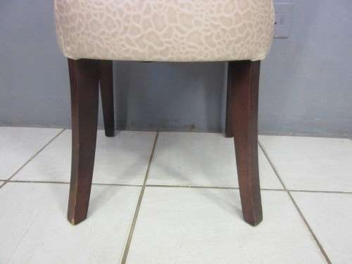 A stunning and extremely stylish high-back occasional chair in a superb patent-leather feel fabric