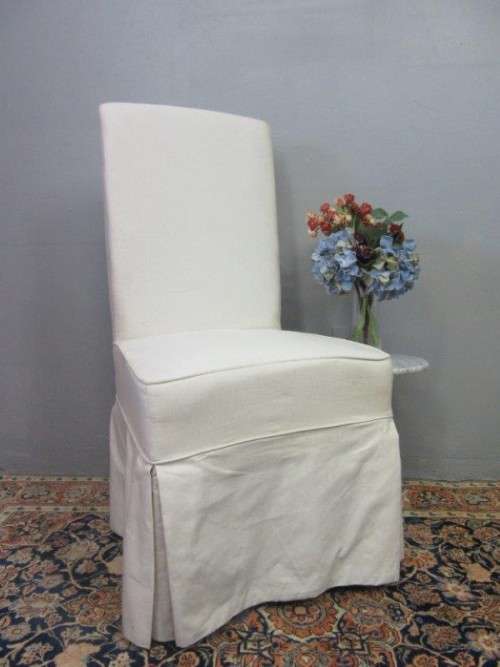 **RS17** A gorgeous high-back skirted upholstered chair in a linen fabric on a beech wood frame