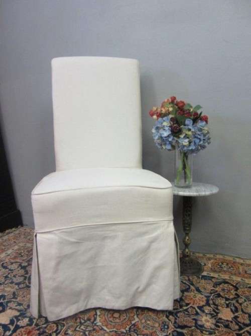 **RS17** A gorgeous high-back skirted upholstered chair in a linen fabric on a beech wood frame