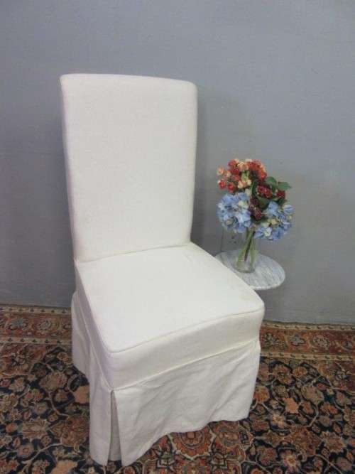 **RS17** A gorgeous high-back skirted upholstered chair in a linen fabric on a beech wood frame