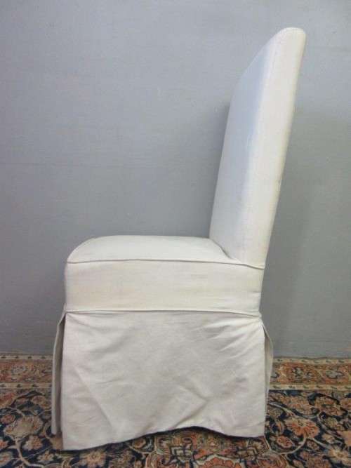 **RS17** A gorgeous high-back skirted upholstered chair in a linen fabric on a beech wood frame