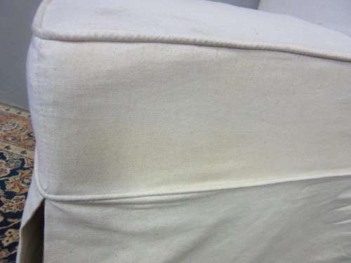 **RS17** A gorgeous high-back skirted upholstered chair in a linen fabric on a beech wood frame