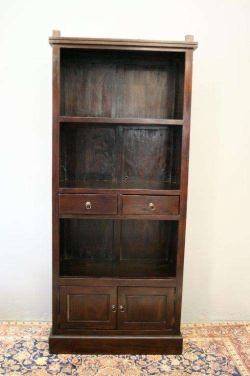 A wonderful tall teak display cabinet/ bookcase with shelves, storage cupboards and drawers