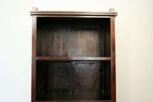 A wonderful tall teak display cabinet/ bookcase with shelves, storage cupboards and drawers