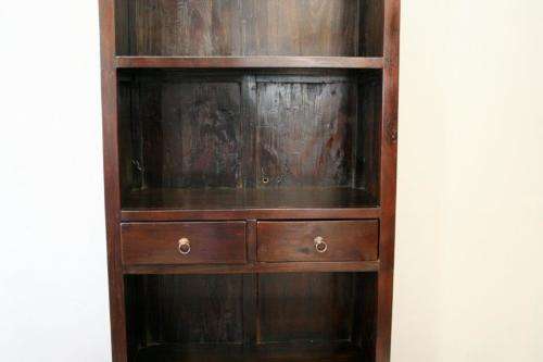 A wonderful tall teak display cabinet/ bookcase with shelves, storage cupboards and drawers