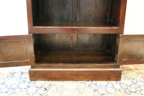 A wonderful tall teak display cabinet/ bookcase with shelves, storage cupboards and drawers