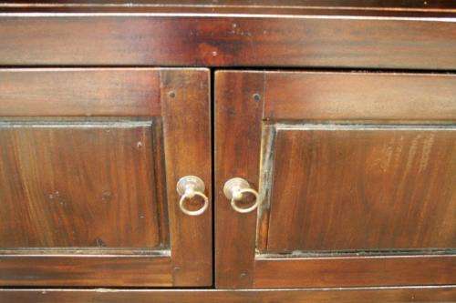 A wonderful tall teak display cabinet/ bookcase with shelves, storage cupboards and drawers