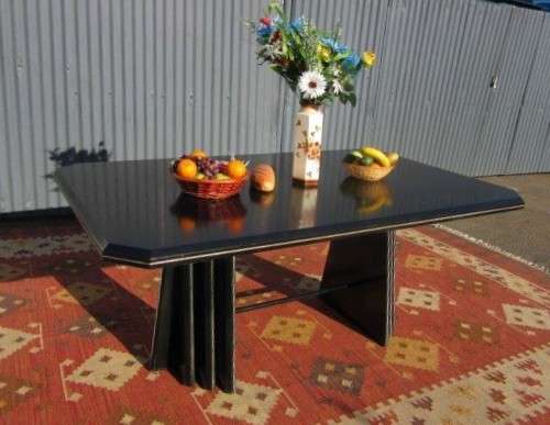 A stunning large retro 8-seater dining table in a gloss black & finished with gold trim - RS17Sale