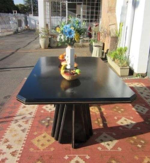 A stunning large retro 8-seater dining table in a gloss black & finished with gold trim - RS17Sale