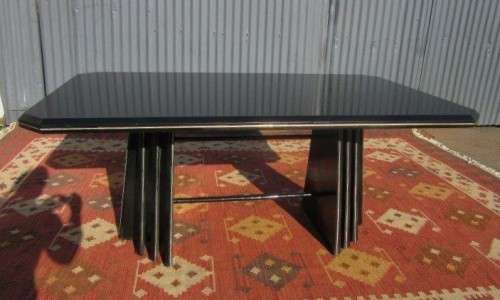 A stunning large retro 8-seater dining table in a gloss black & finished with gold trim - RS17Sale