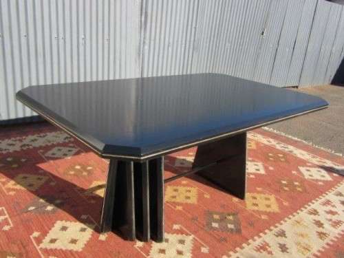 A stunning large retro 8-seater dining table in a gloss black & finished with gold trim - RS17Sale