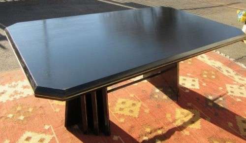 A stunning large retro 8-seater dining table in a gloss black & finished with gold trim - RS17Sale