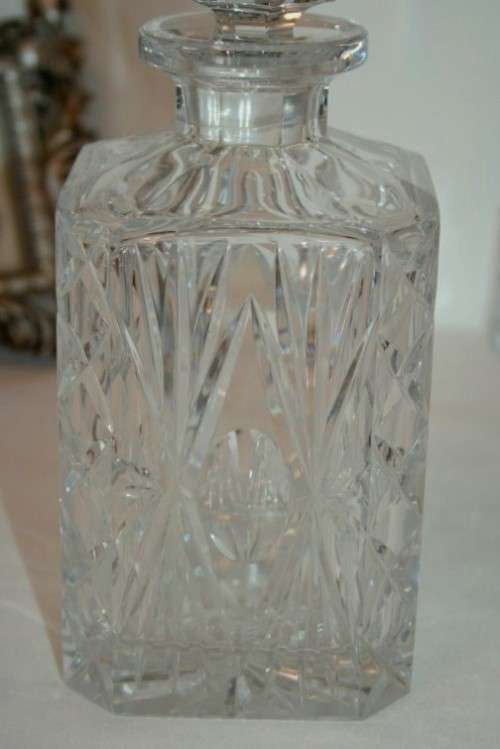 A beautiful classy classic ornate lead cut-crystal whiskey/ brandy decanter w/ a cut-crystal stopper