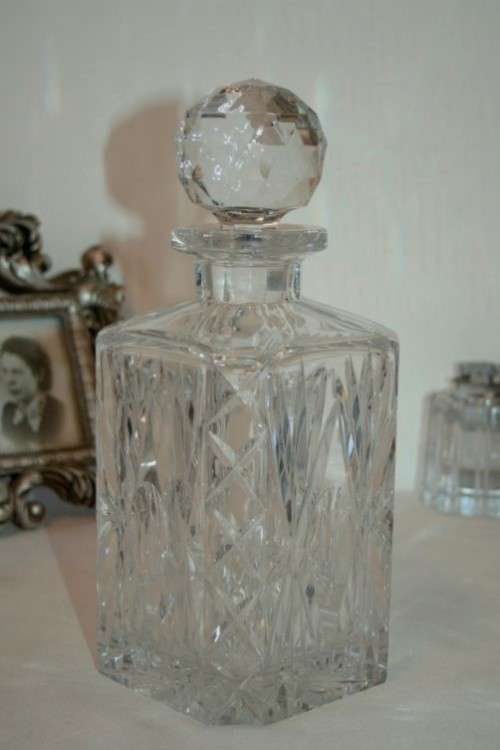 A beautiful classy classic ornate lead cut-crystal whiskey/ brandy decanter w/ a cut-crystal stopper