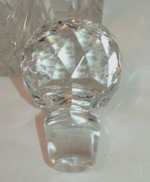 A beautiful classy classic ornate lead cut-crystal whiskey/ brandy decanter w/ a cut-crystal stopper