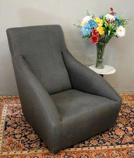 A stylish modern upholstered occasional armchair/ single couch - stunning