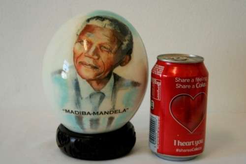 A superb and stunningly made "Nelson Mandela - Madiba" genuine ostrich egg on a carved stand