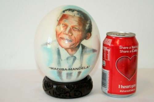 A superb and stunningly made "Nelson Mandela - Madiba" genuine ostrich egg on a carved stand