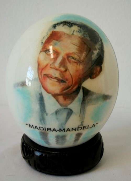A superb and stunningly made "Nelson Mandela - Madiba" genuine ostrich egg on a carved stand
