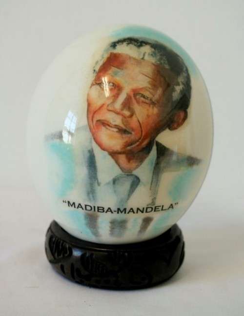 A superb and stunningly made "Nelson Mandela - Madiba" genuine ostrich egg on a carved stand