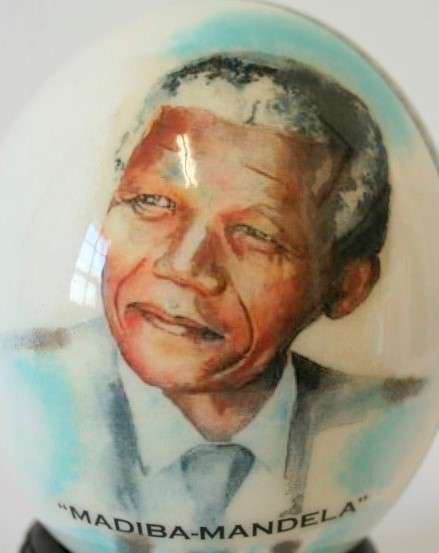 A superb and stunningly made "Nelson Mandela - Madiba" genuine ostrich egg on a carved stand