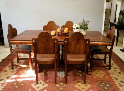 An awesome vintage 6-seater dining room suite w/ a solid table and six upholstered dining chairs