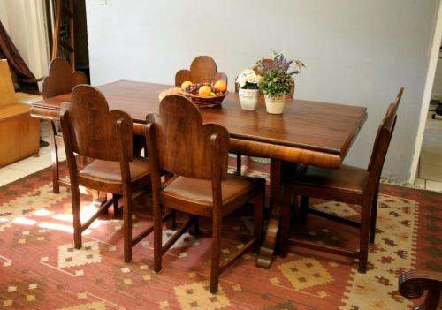 An awesome vintage 6-seater dining room suite w/ a solid table and six upholstered dining chairs
