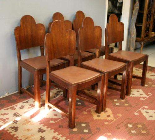 An awesome vintage 6-seater dining room suite w/ a solid table and six upholstered dining chairs