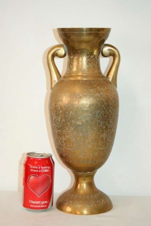 A gorgeous tall solid brass Indian made urn vase with beautiful hand chased floral detailing