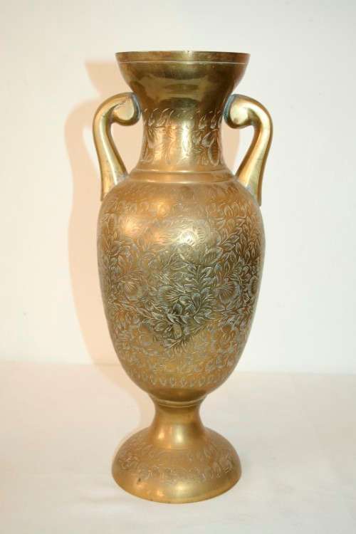 A gorgeous tall solid brass Indian made urn vase with beautiful hand chased floral detailing
