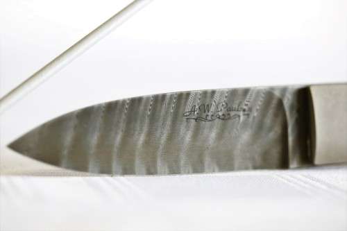 A beautifully made original Willie Paulsen Warthog Ivory-handle knife with Damascus steel blade!!
