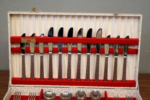 A fabulous (boxed) vintage British made "Unity" stainless steel 6-setting (42-piece) cutlery set
