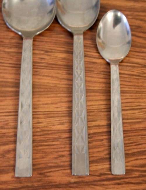 A fabulous (boxed) vintage British made "Unity" stainless steel 6-setting (42-piece) cutlery set