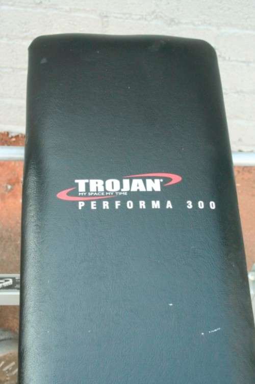 A fantastic original Trojan Performa 300 bench assorted weights in awesome condition