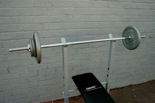 A fantastic original Trojan "Performa 300" bench & assorted weights in awesome condition