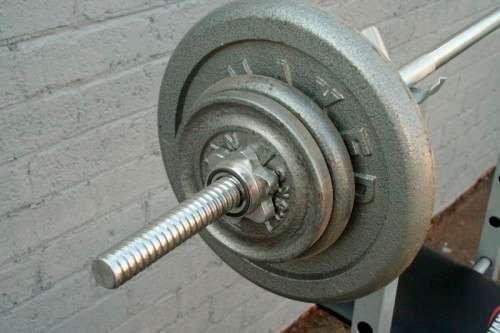 A fantastic original Trojan "Performa 300" bench & assorted weights in awesome condition