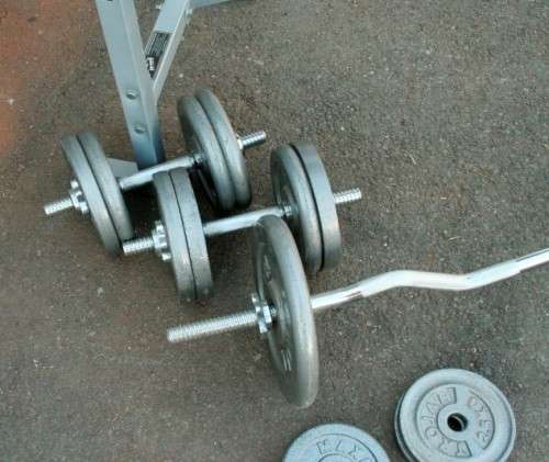 A fantastic original Trojan "Performa 300" bench & assorted weights in awesome condition