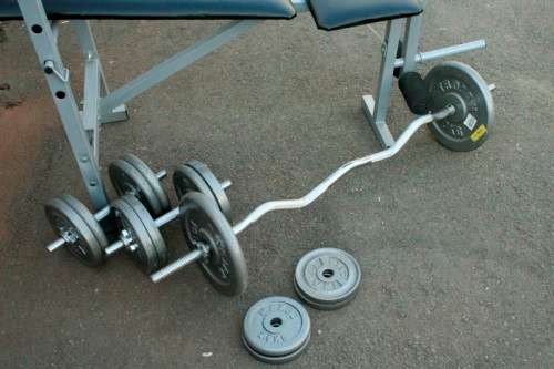 A fantastic original Trojan "Performa 300" bench & assorted weights in awesome condition