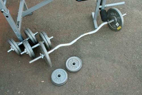 A fantastic original Trojan "Performa 300" bench & assorted weights in awesome condition