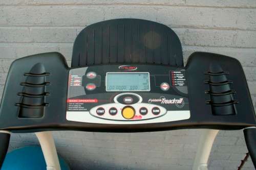 An incredible computerised original "Trojan" Optix Fold-able treadmill with hand-bar speed controls