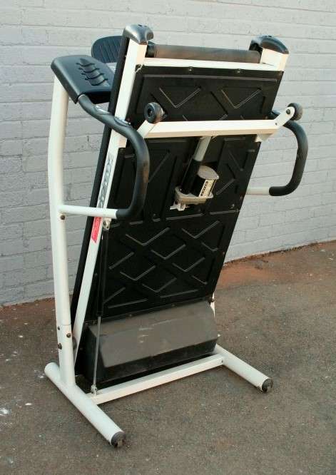 An incredible computerised original "Trojan" Optix Fold-able treadmill with hand-bar speed controls