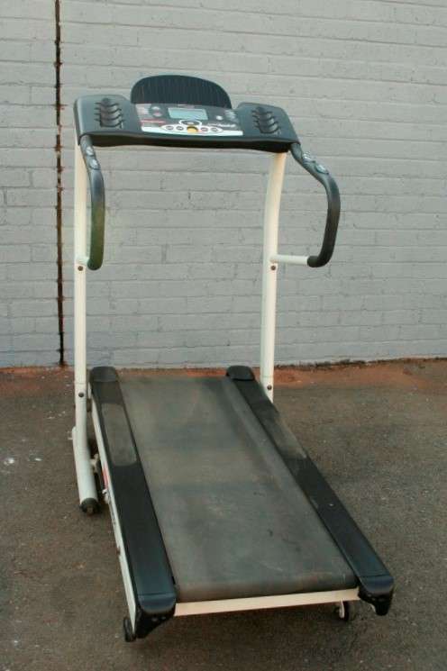 An incredible computerised original "Trojan" Optix Fold-able treadmill with hand-bar speed controls