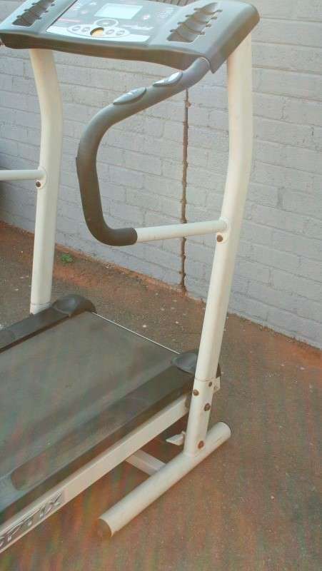 An incredible computerised original "Trojan" Optix Fold-able treadmill with hand-bar speed controls