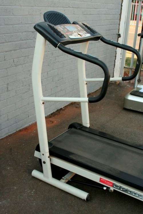 An incredible computerised original "Trojan" Optix Fold-able treadmill with hand-bar speed controls