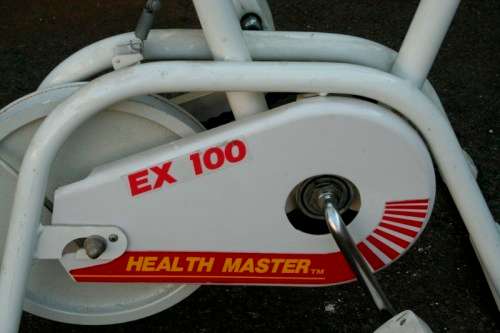 A fabulous vintage "Health Master" Ex-100 stationary bicycle with tension adjuster & speedometer